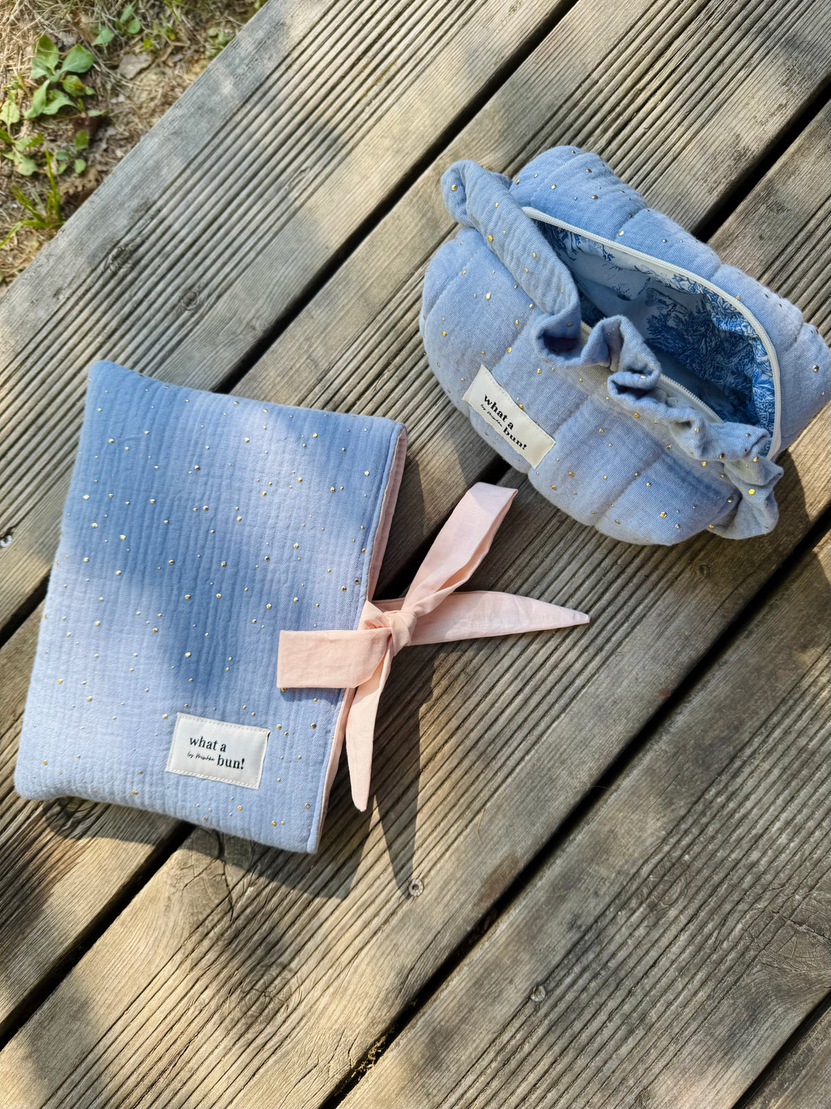 Blue padded Book Bag with golden dots
Blue Book Bag with fabric bow
Blue and gold Make up Bag
Blue padded Make up Bag with golden dots
Blue Make up Bag 
Blue and gold Make up Bag